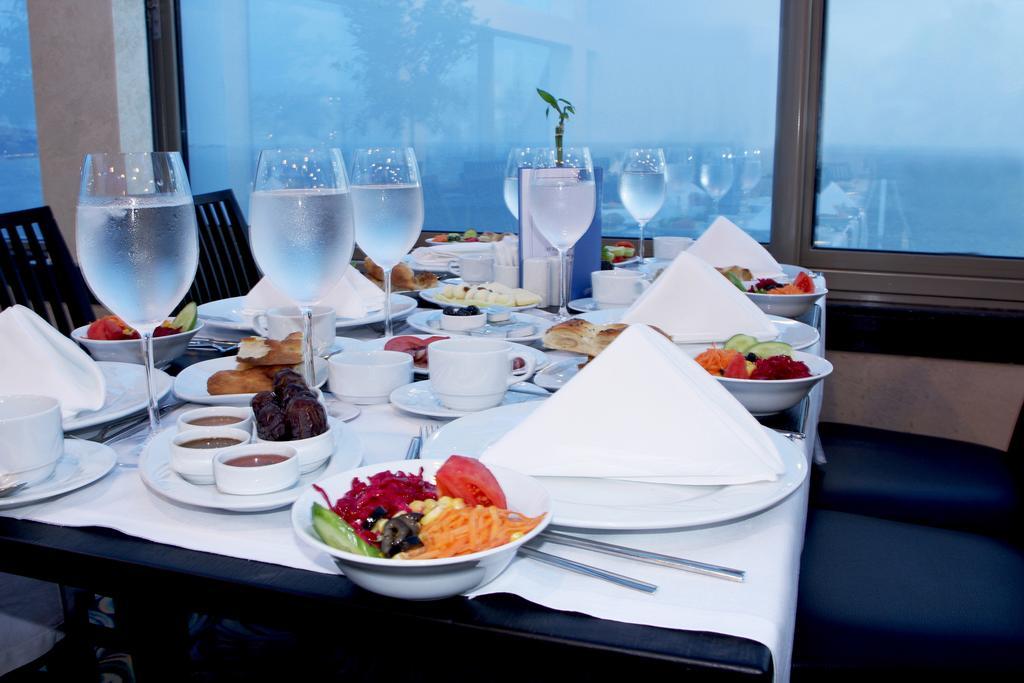 Eser Premium Hotel & Spa Buyukcekmece Exterior photo A table set for a meal